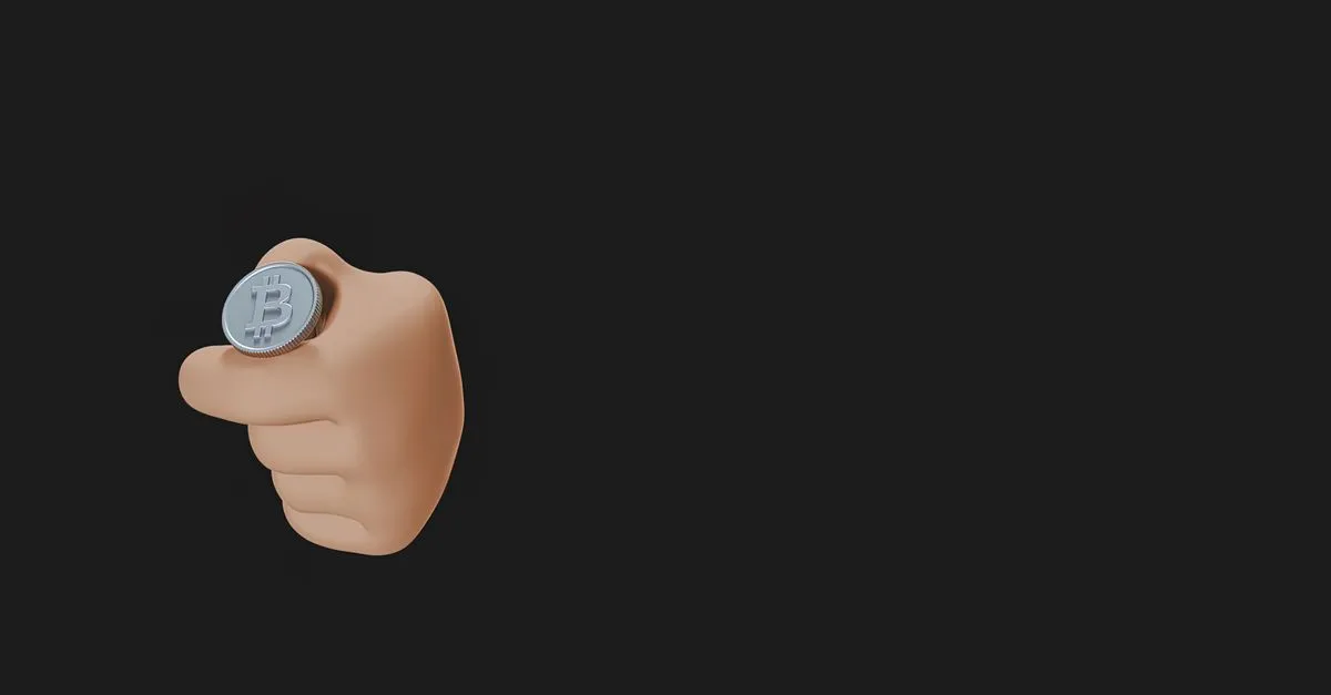 Hand tossing a coin in the air for a heads or tails decision